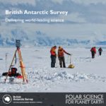 Scientists surveying the ground in an icy landscape with mountians in the background